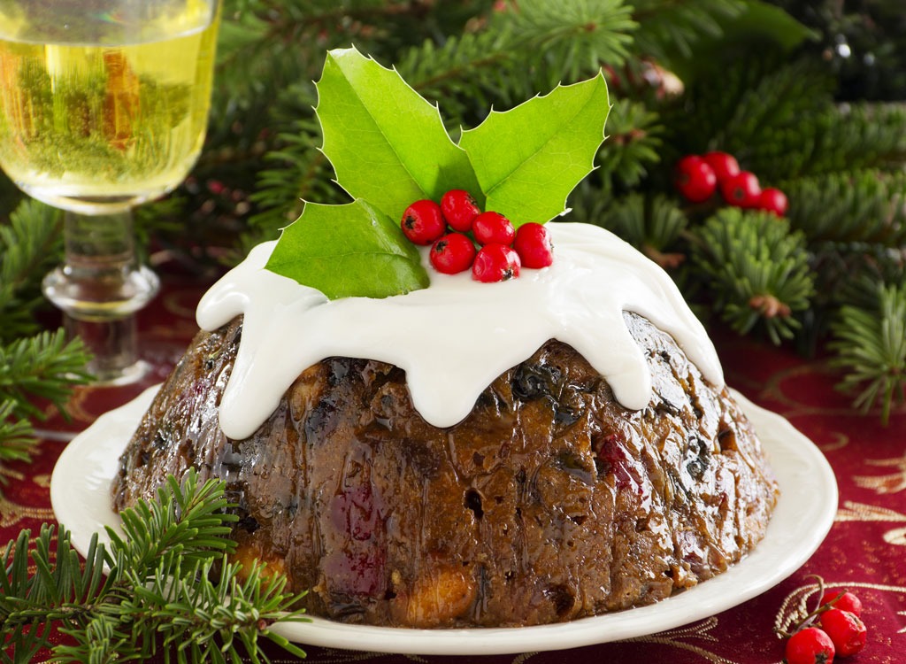 Premium Photo | Happy asian woman eating tasty christmas fruit cake  christmas dinner party with delicious piece of xmas cake new year and  christmas concept