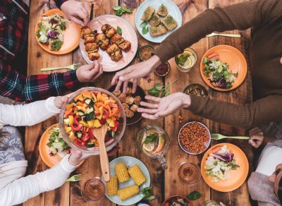 Friends passing food