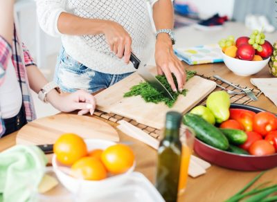 Cooking and cutting vegetables at home