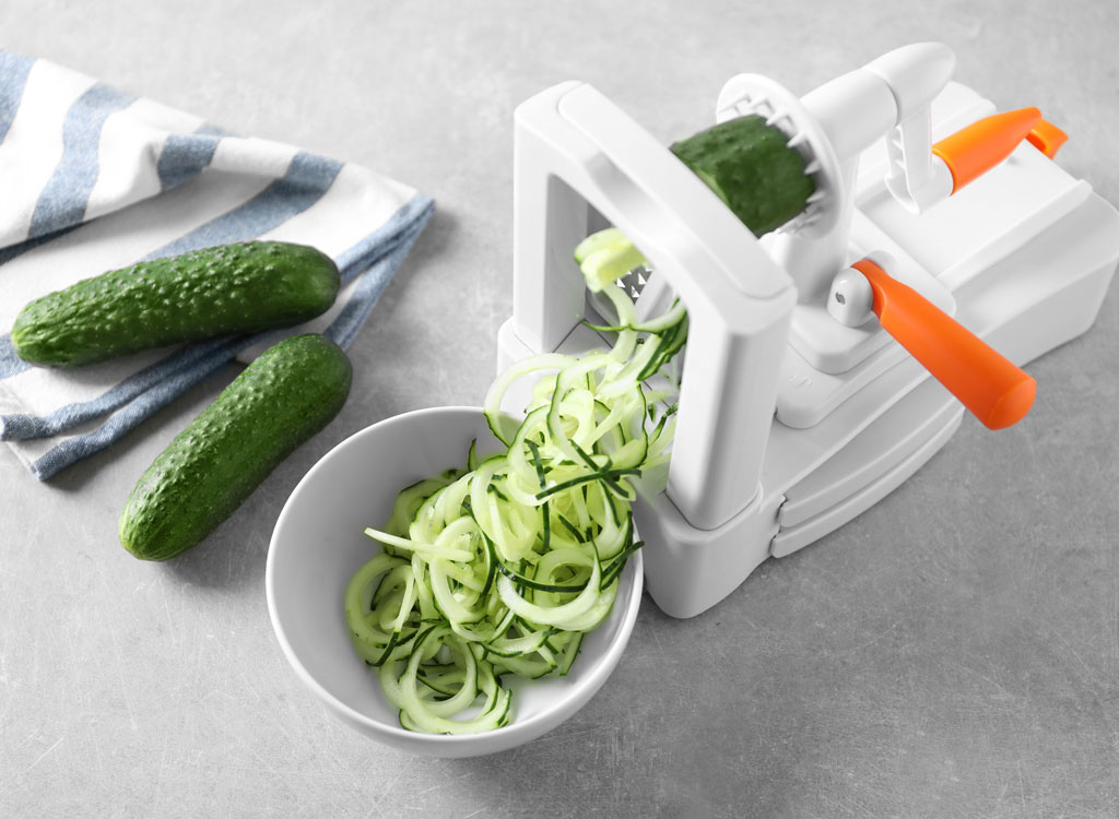 https://www.eatthis.com/wp-content/uploads/sites/4/2018/05/spiralizer-tool-cucumber.jpg?quality=82&strip=1