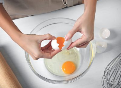 crack eggs into bowl