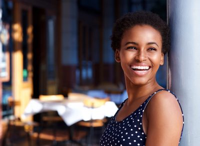 a close-up shot of a woman smiling