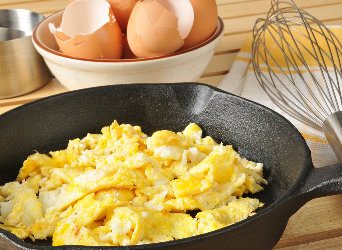https://www.eatthis.com/wp-content/uploads/sites/4/2019/05/scrambled-eggs-in-cast-iron-skillet.jpg?quality=82&strip=1