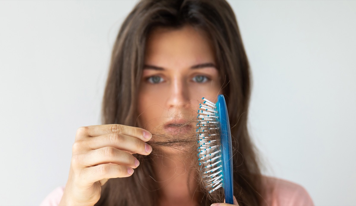 Proven Ways To Eliminate Hair Loss Experts Say Don T Eat It Review   Woman Anemia Hair Brush 