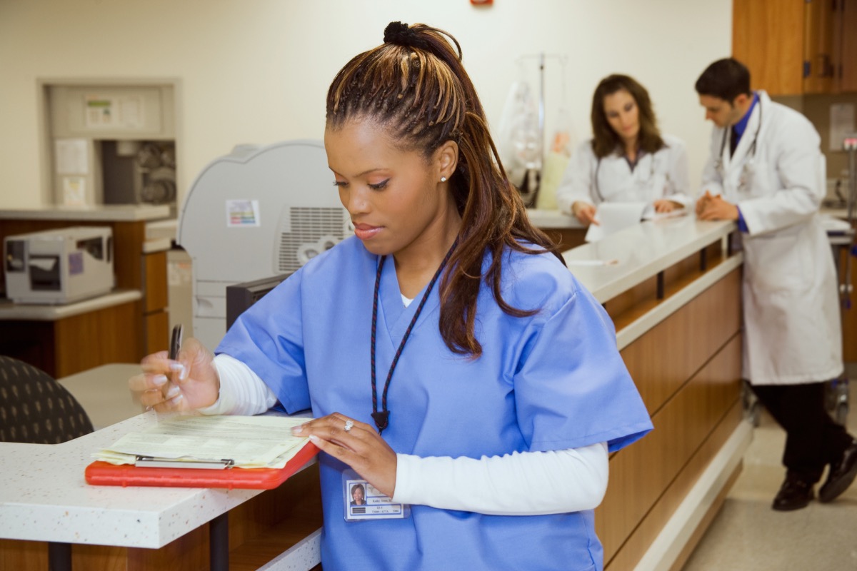 Nurse At Ward Counter