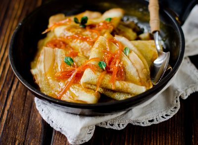 crepes suzette in a bowl