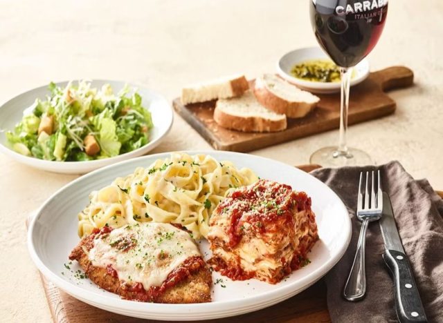 Carrabba's meal on a table with red wine