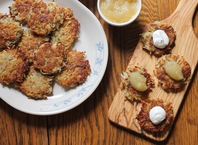 Finished latkes with sauces ready to eat on Hanukkah