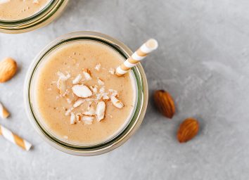 https://www.eatthis.com/wp-content/uploads/sites/4/2019/11/protein-shake-with-coconut-and-almonds.jpg?quality=82&strip=all&w=354&h=256&crop=1