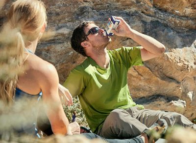 Man drinking orgain protein shake