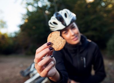 Woman eating protein cookie