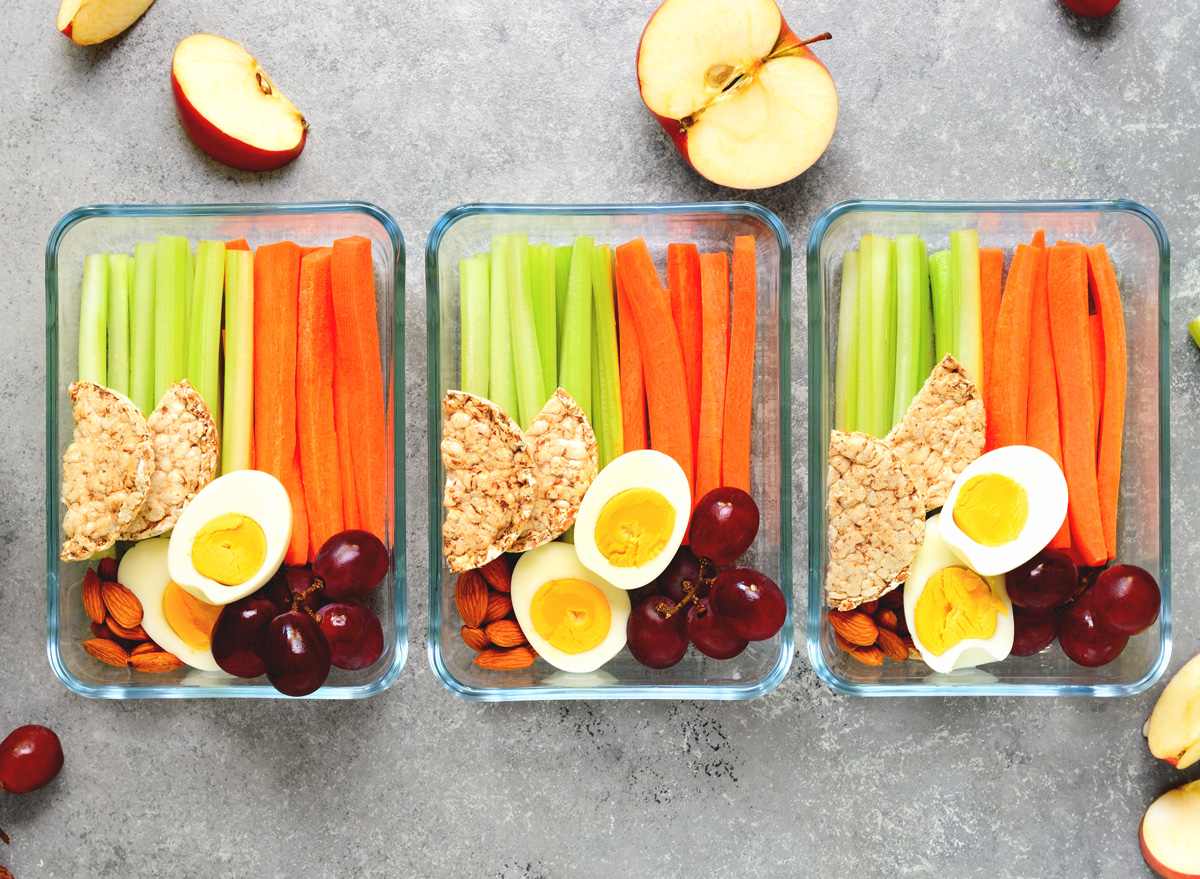 https://www.eatthis.com/wp-content/uploads/sites/4/2020/03/healthy-snack-meal-prep-veggies-carrot-cut-grapes-hard-boiled-eggs-almonds-apples.jpg?quality=82&strip=1