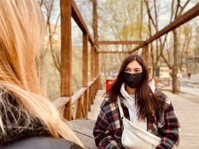 two girls wearing protective masks during coronavirus quarantine