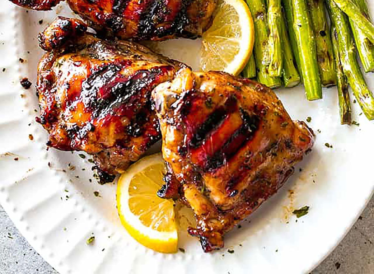 https://www.eatthis.com/wp-content/uploads/sites/4/2020/05/Grilled-Chicken-Thighs-diethood.jpg