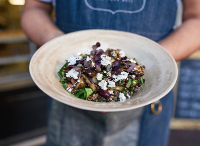 server holding salad