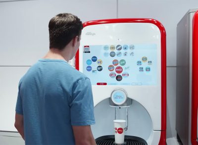 customer in front of coca cola soda fountain