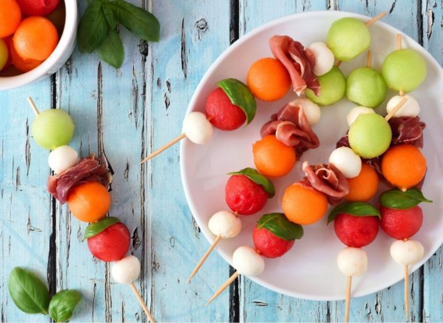 skewers with watermelon, cantaloupe, cheese, and meat