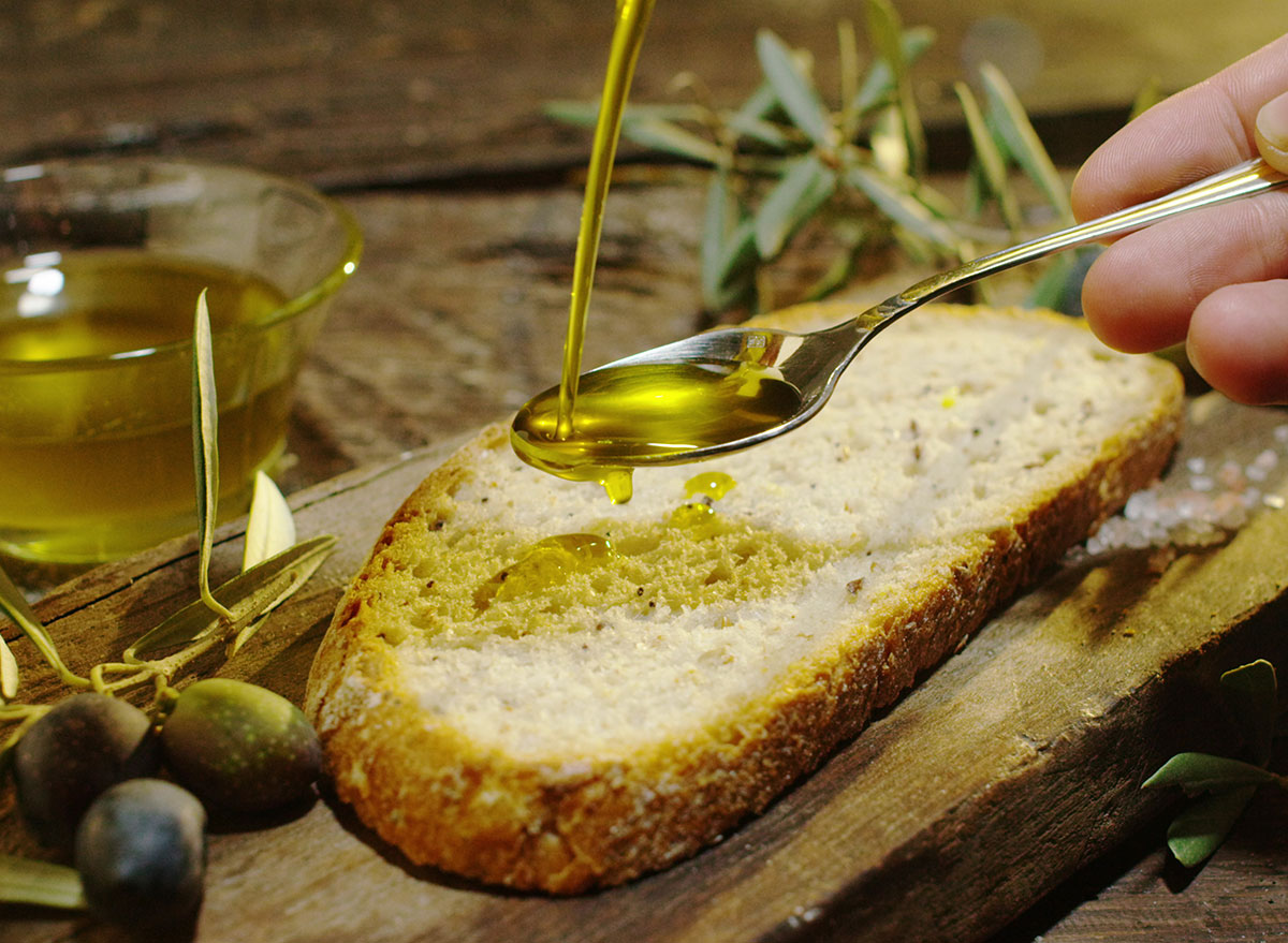 Is Olive Oil Good for You - olive oil on bread