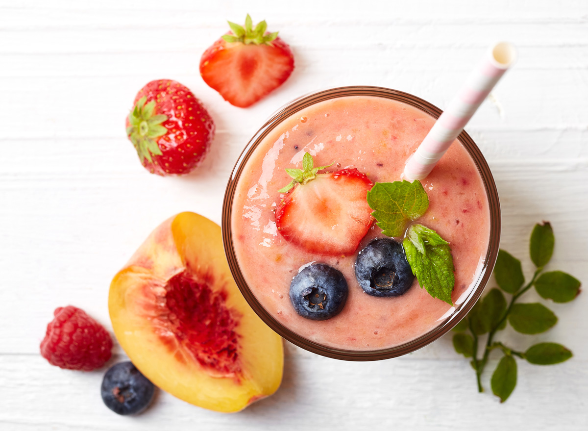 https://www.eatthis.com/wp-content/uploads/sites/4/2020/11/blueberry-peach-strawberry-smoothie.jpg?quality=82&strip=1
