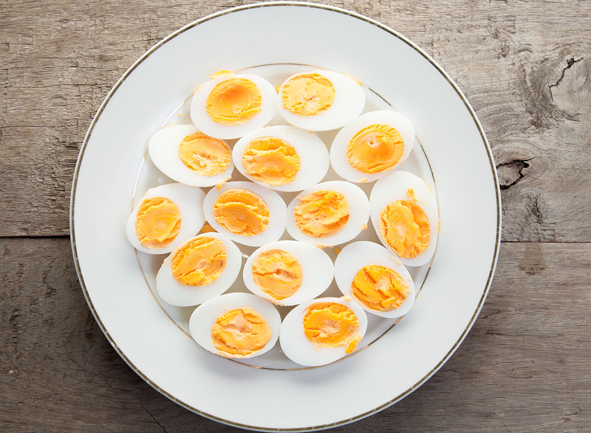 https://www.eatthis.com/wp-content/uploads/sites/4/2020/12/hard-boiled-eggs.jpg?quality=82&strip=1