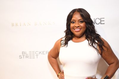 sherri shepherd in white dress on red carpet