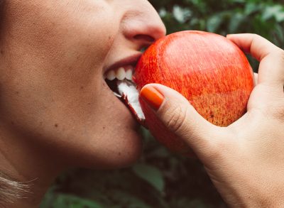 woman eating an apple