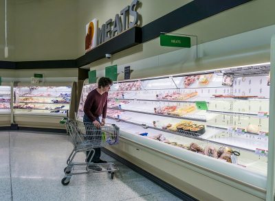 man standing in publix meat aisle with empty shelves