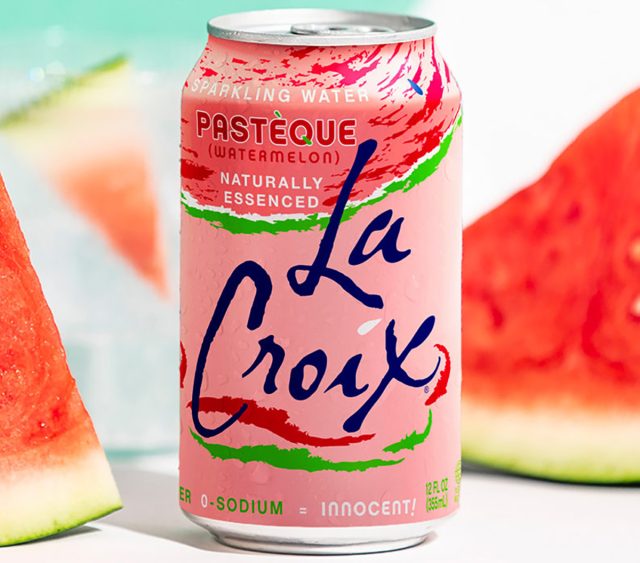 A can of the pasteque-flavored LaCroix sparkling water next to slices of watermelon