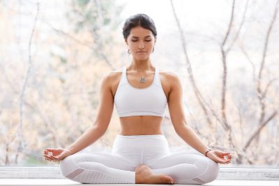 woman at peace doing yoga