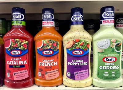 bottles of salad dressing on grocery shelves