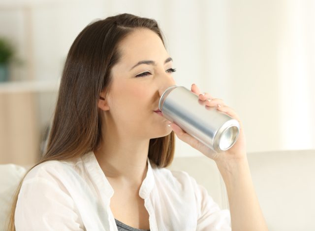 woman drinking soda