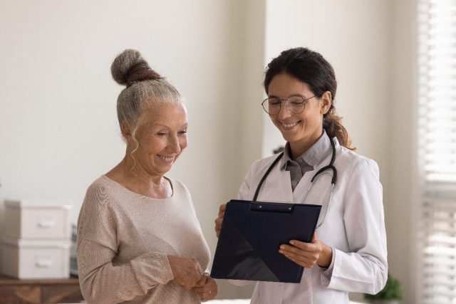 happy doctor with patient