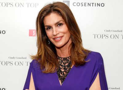 cindy crawford at event in purple ensemble