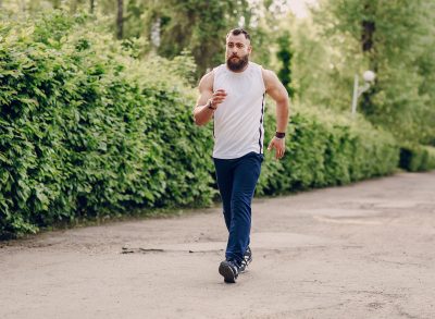 fit man walking outside