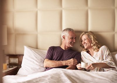 Princess Cruises couple in Princess Luxury Bed