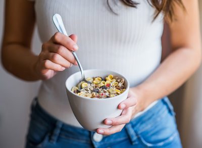 enjoying an oatmeal breakfast bowl