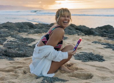 pro surfer Coco Ho with SAMBAZON on beach, shares her jiu-jitsu workout