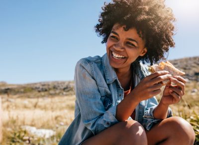 woman eating sandwich