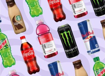 variety of bottled drinks on a purple background