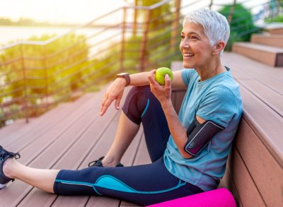 Woman eating an apple