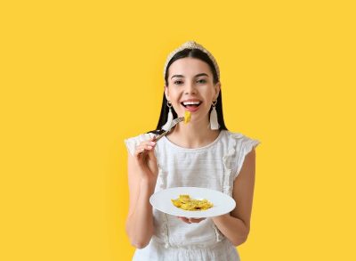 woman eating pasta