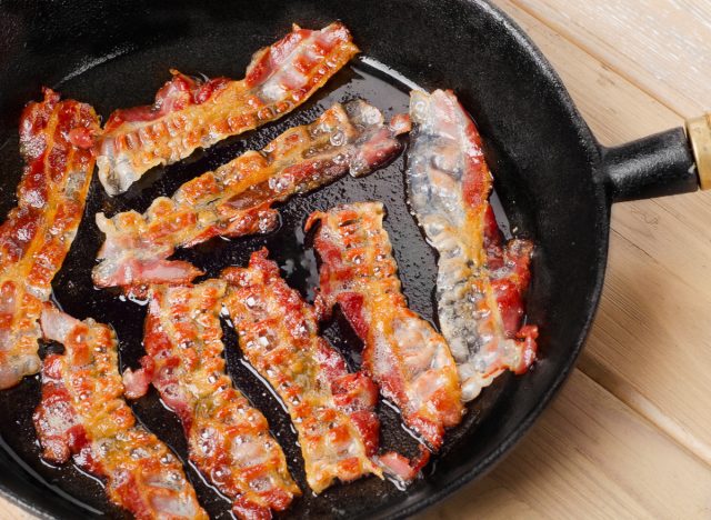 bacon cooking in skillet