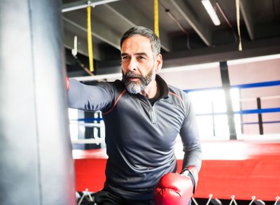 man demonstrating exercises that aren't aging you faster