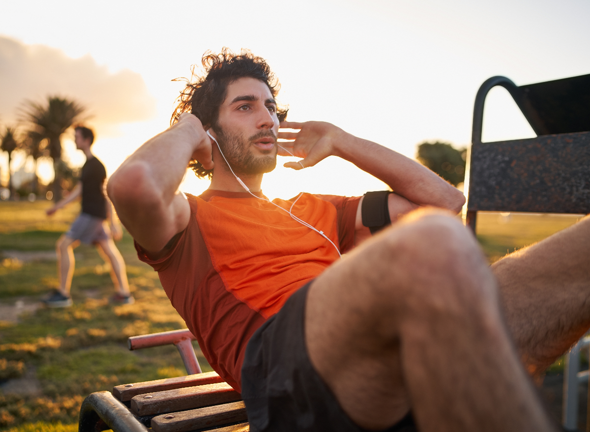 Crunches with weights online on stomach