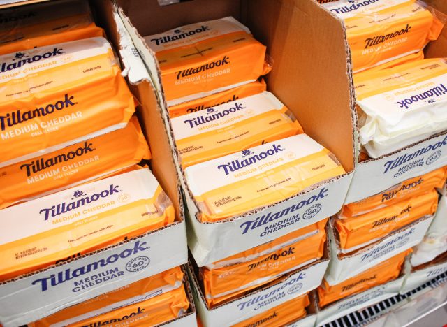 https://www.eatthis.com/wp-content/uploads/sites/4/2022/09/tillamook-medium-cheddar-cheese-blocks-grocery-store.jpg?quality=82&strip=all&w=640