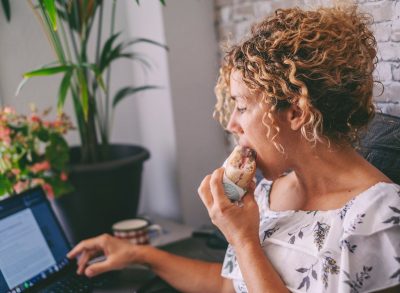 woman eating sandwich