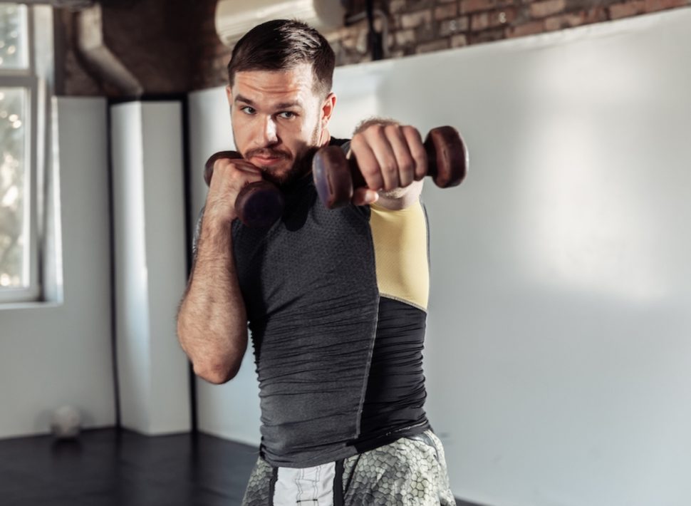 Combat Your Fat Rolls With This Dumbbell Workout, Trainer Says