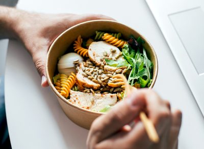 high protein lunch bowl chicken arugula pasta eggs seeds