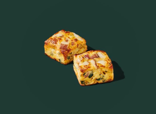 two Starbucks potato bakes on a green background 