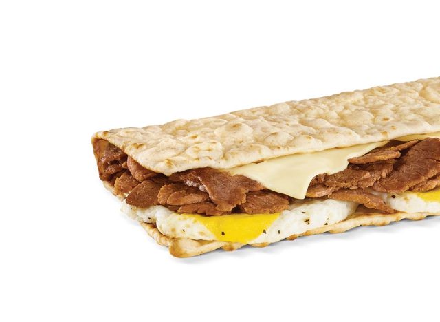 Subway Steak and Egg Flatbread on a white background